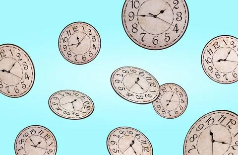 Many stylish clocks falling on light blue background Foto stock