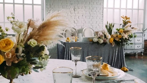 Many tables are decorated with lemons and yellow flowers. Stock Footage 120681985