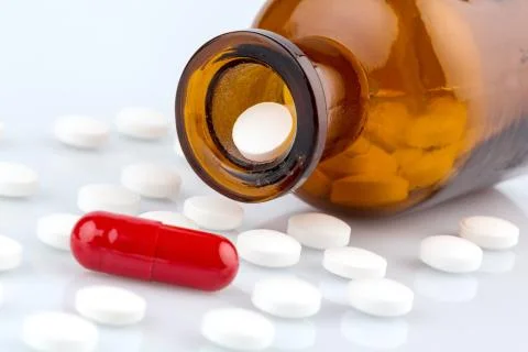 Many tablets with container Stock Photos