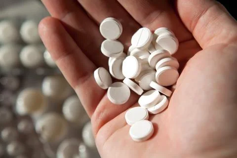 Many tablets in hand Foto stock