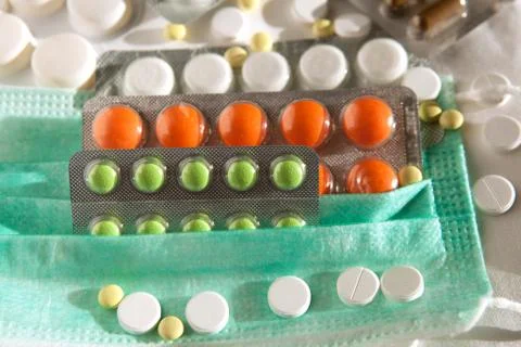 Many tablets on the mask Stock Photos