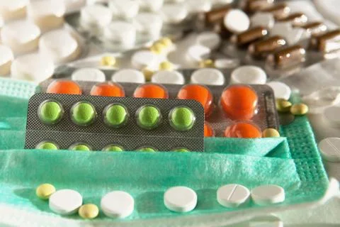 Many tablets on the mask Stock Photos