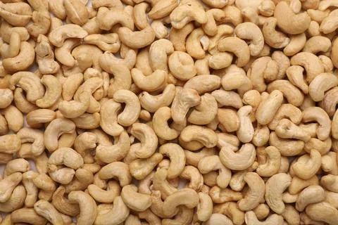 Many tasty cashew nuts as background, top view Stock Photos