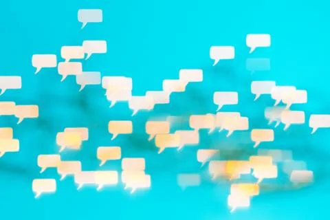 Many thinking and talking entities on turquiose background Stock Photos