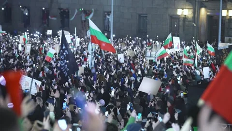 Many thousands protest with phone lights and flags in evening Sofia 스톡 동영상 324560216