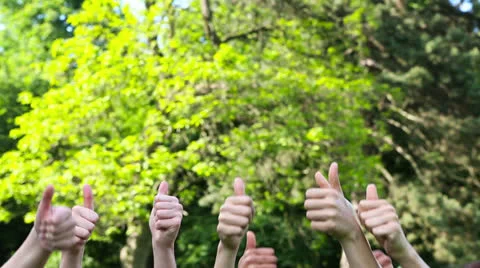 Many thumbs up congratulate a winner Stock Footage 24827194