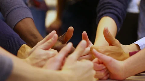 Many thumbs up on a table Video stock 33291730