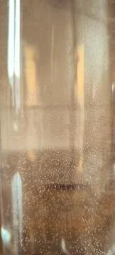 Many tiny air bubbles rising in fresh clear water. 库存照片