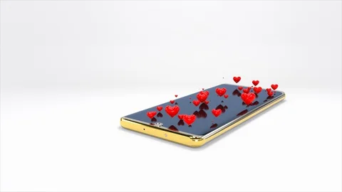 Many tiny red heart floated up from the phone screen. Stock Footage 129965397