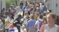 Many tourists walking on Rambla de Mar in Barcelona 4k or 4k+ Resolution