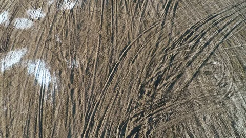 Many traces from the wheels on the ground. The Dirty Road 24 Video stock 88335720