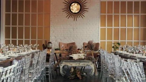  Many transparent chairs stand in two rows near tables Stock Footage 127702194