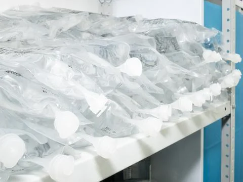 Many transparent packages with saline solution. Stock Photos