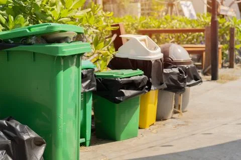 Many trash containers for waste sorting by categories for next recycling on.. Stock Photos