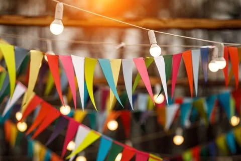 Many triangular flags for the holiday. Stock Photos