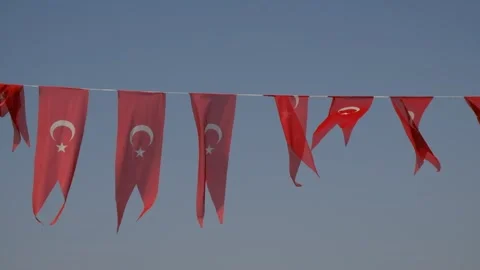Many Turkish flags hanging at street against blue sky Stock-Footage 281557589