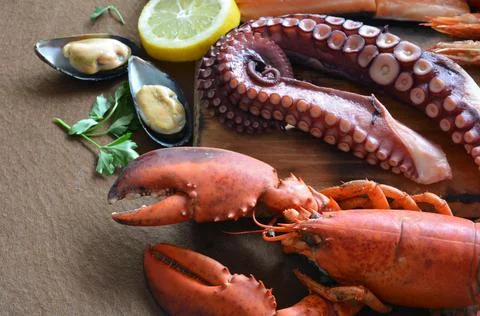 Many types of fish on the table. Stock Photos