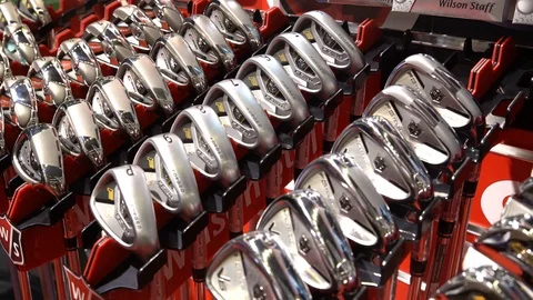Many types of golf club in golf shop Stock Footage