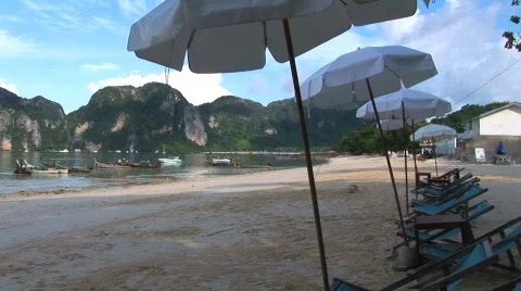 Many umbrellas on beach Stock Footage 296007