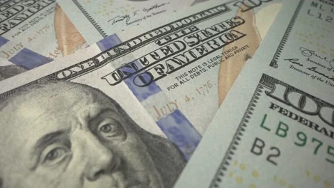 Many US banknotes 100 dollars on the table. Super Macro shot with panorama Stock Footage 129615028
