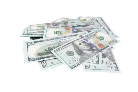 Many US dollar banknotes isolated on white background. Stock Photos