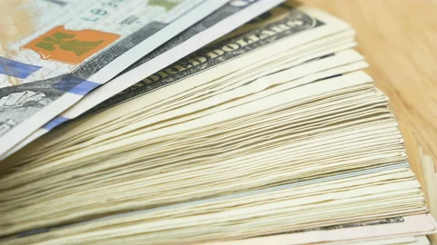 Many US dollars bank notes stack rotation Stock Footage 155804325