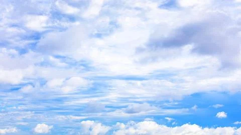 Many various white clouds in blue sky in summer Stock Photos