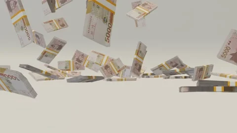 Many wads of money falling on table. 5000 South Korean Won banknotes. Stock Footage 172357624