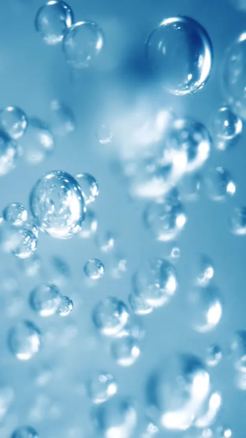 Many water bubbles in blue water close up, abstract water wave with bubbles.. Stock Footage 346393729