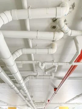 Many water pipe at the condominium Stock Photos