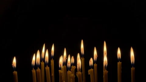 Many wax thin candles burn brightly. Religion concept. Stock-Footage 172537860