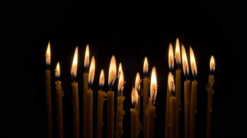 Many wax thin candles burn brightly. Religion concept. Stock-Footage 197041233
