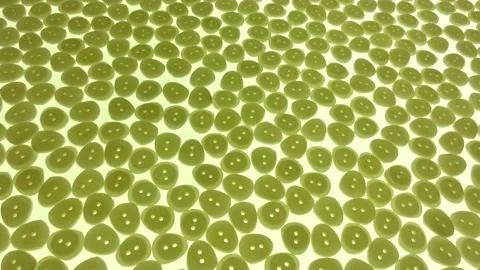 Many white buttons for clothes on a white background. Stock Footage 139969960