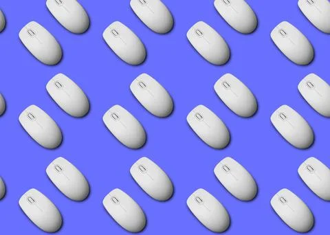 Many white computer mouses on blue background, flat lay. Seamless pattern des Stock Photos