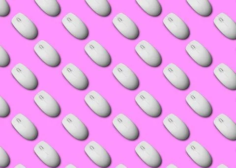 Many white computer mouses on pink background, flat lay. Seamless pattern des Stock Photos