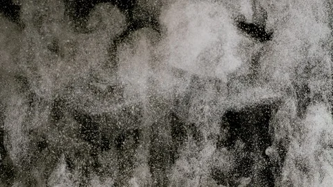 Many white dust particles ascending slowly like from an explosion Stock Footage 90562065