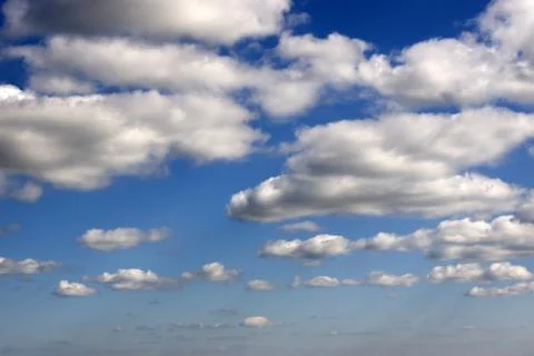 Many white fluffy clouds Stock Photos