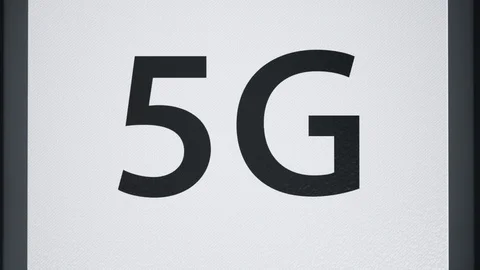 Many of white glossy boxes with 5g symbol for devices on a white background. 動画素材 117142424