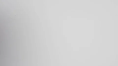 Many white pills Asprin falling on white background Stock Footage 81049470