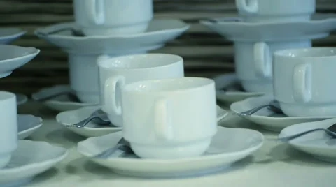 Many White Tea Cups in Table Video stock 58356815