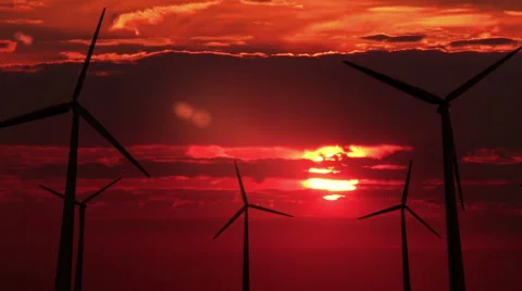 Many wind mills against red sunset - 4K Stock Footage 45968016