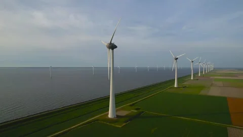Many wind mills along the sea shore in the Netherlands. Video stock 282912410