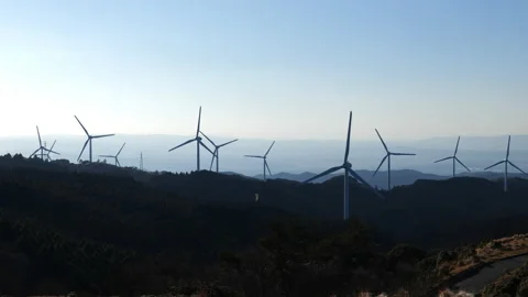 Many Wind Turbines Rotating in the Wind Stock Footage 149261896