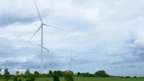 Many wind turbines stand tall in the landscape for generating electricity Stock Footage 308287448