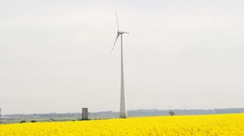 Many windmills rotating during windy spring cloudy day Stock Footage 62497252