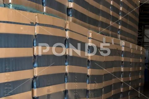 Many wine bottles packed for wholesale at winery Stock Photos
