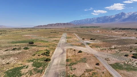 Manzanar Airfield Pull Back And Ascend Aerial Day Stock Footage 319009659