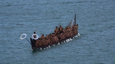 Maori warriors paddling waka taua (war Stock Video Pond5