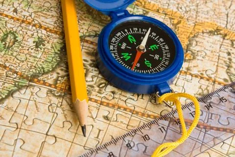 Map and compass Stock Photos
