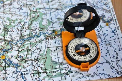 Map and compass. Stock Photos